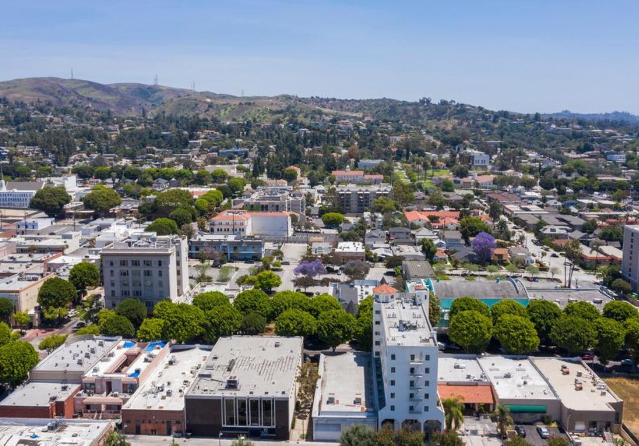 Specialist from CURA Termite and Pest Control in Whittier, CA, conducting thorough pest control measures to protect a property from infestations.